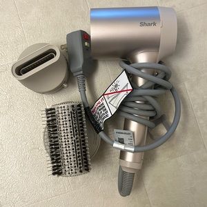 Shark hairdryer with attachments.